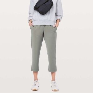 NWOT Lululemon On The Fly Crop *Woven 23"
Grey Sage size 4